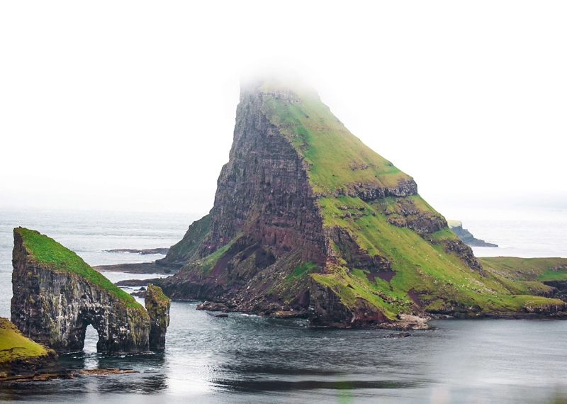 Group of friends laughing together outdoors